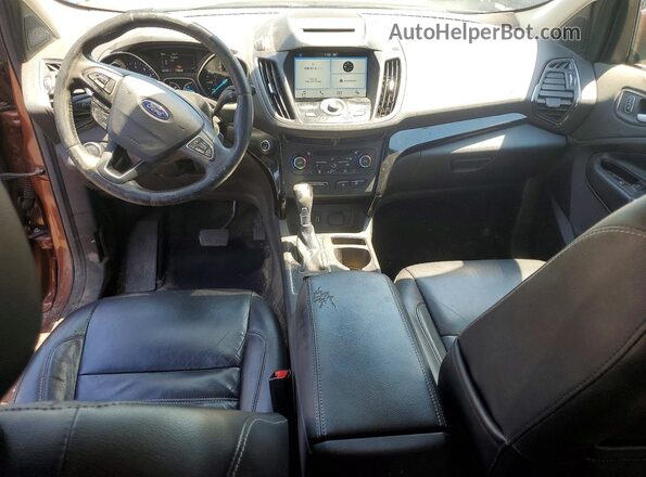 1FMCU0J99HUD51357 2017 FORD ESCAPE Оранжевый Вид панели приборов