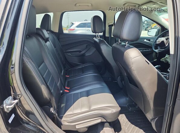 1FMCU0J9XGUA03968 2016 FORD ESCAPE Черный Вид задней части салона