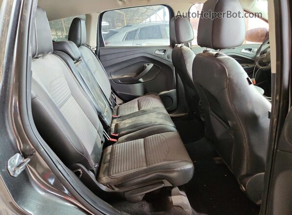 1FMCU0J9XHUD19940 2017 FORD ESCAPE Gray Vista de los asientos traseros
