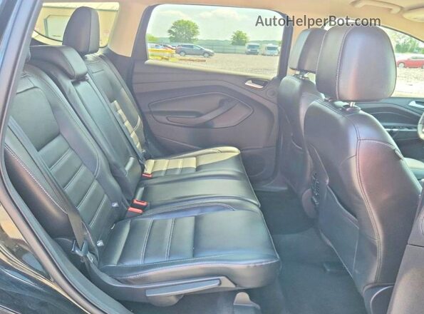1FMCU0JD1HUD74801 2017 FORD ESCAPE Black Rear seats view
