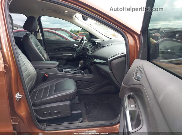 1FMCU0JD4HUE33260 2017 FORD ESCAPE Orange Front interior view