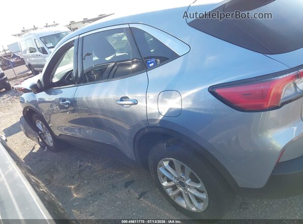 1FMCU9BZ5NUA09287 2022 FORD ESCAPE Серебряный Вид задней части салона