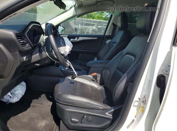 1FMCU9CZ4MUA70210 2021 FORD ESCAPE White Вид салону спереду