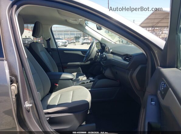 1FMCU9F62MUA73799 2021 FORD ESCAPE Gray წინა სალონის ხედი