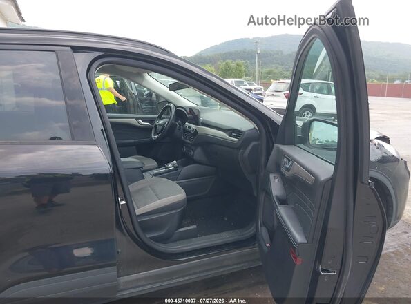 1FMCU9G62MUB09702 2021 FORD ESCAPE Black Widok wnętrza z przodu