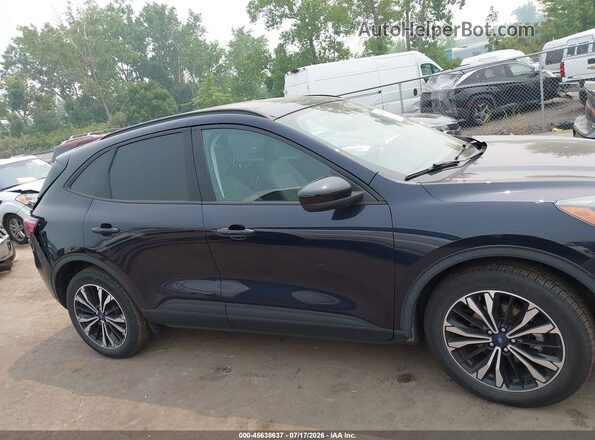 1FMCU9G68MUA24167 2021 FORD ESCAPE Dark Blue Вид задней части салона