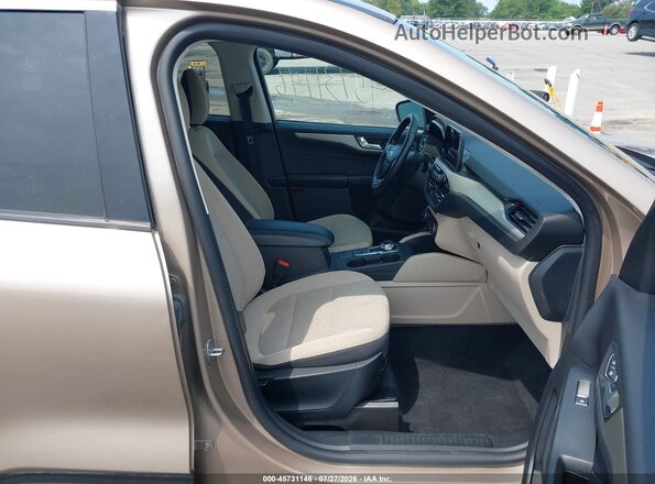 1FMCU9G69MUA99475 2021 FORD ESCAPE Beige Widok wnętrza z przodu