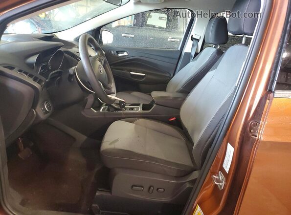 1FMCU9G90HUB67355 2017 FORD ESCAPE Коричневый Вид салона спереди