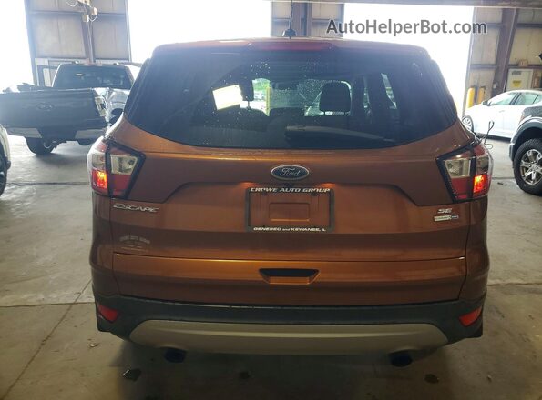 1FMCU9G90HUB67355 2017 FORD ESCAPE Коричневый Вид сзади