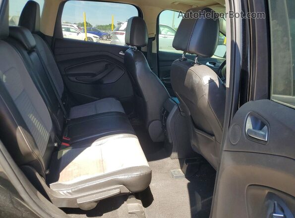 1FMCU9G90HUE68580 2017 FORD ESCAPE Черный Вид задней части салона