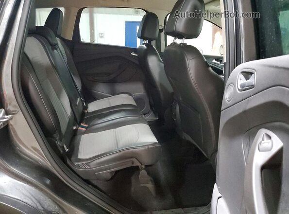 1FMCU9G91HUD38890 2017 FORD ESCAPE Charcoal Rear interior view