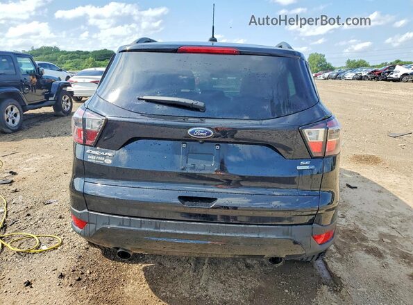 1FMCU9G97HUB87764 2017 FORD ESCAPE Черный Вид сзади