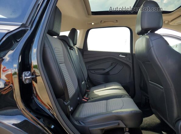 1FMCU9G97HUB87764 2017 FORD ESCAPE Черный Вид задней части салона