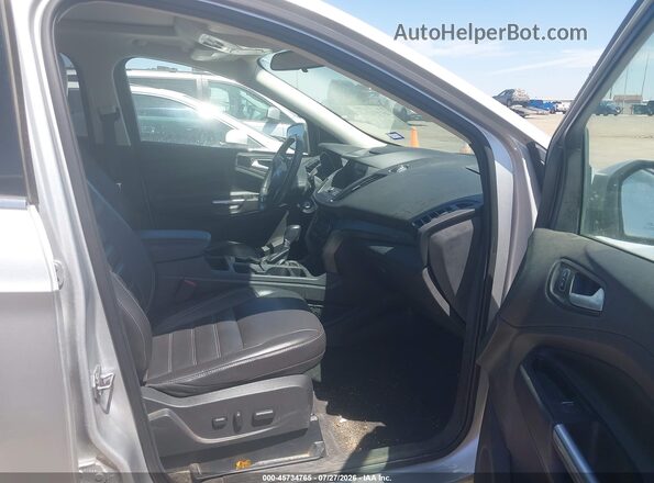 1FMCU9G97HUD67908 2017 FORD ESCAPE Silver Widok wnętrza z przodu