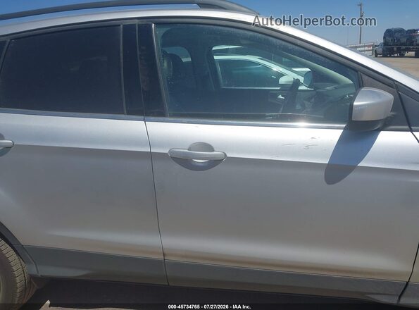 1FMCU9G97HUD67908 2017 FORD ESCAPE Silver Widok wnętrza z tyłu