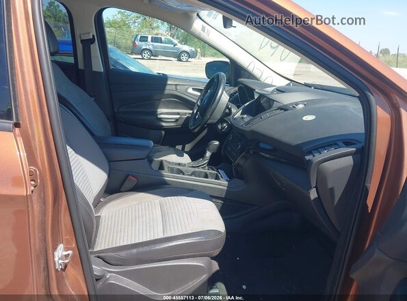 1FMCU9G99HUE68058 2017 FORD ESCAPE Orange Front interior view