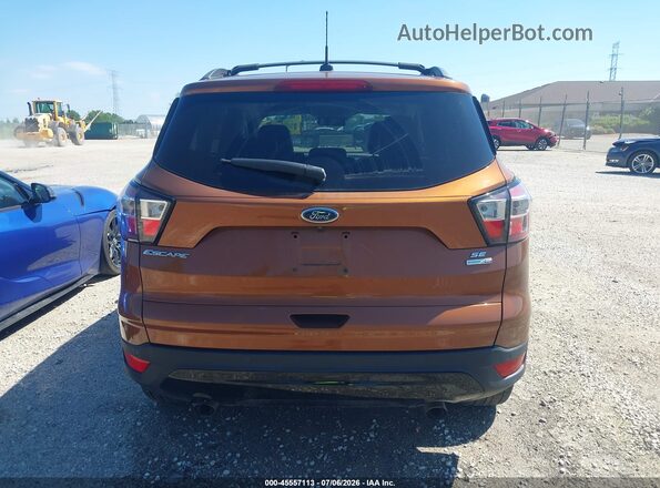 1FMCU9G99HUE68058 2017 FORD ESCAPE Orange 