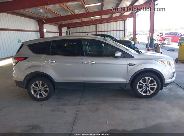 1FMCU9GD0HUE49967 2017 FORD ESCAPE Серебряный Вид задней части салона