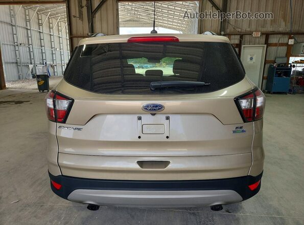 1FMCU9GD0JUB10891 2018 FORD ESCAPE Gold Vista trasera