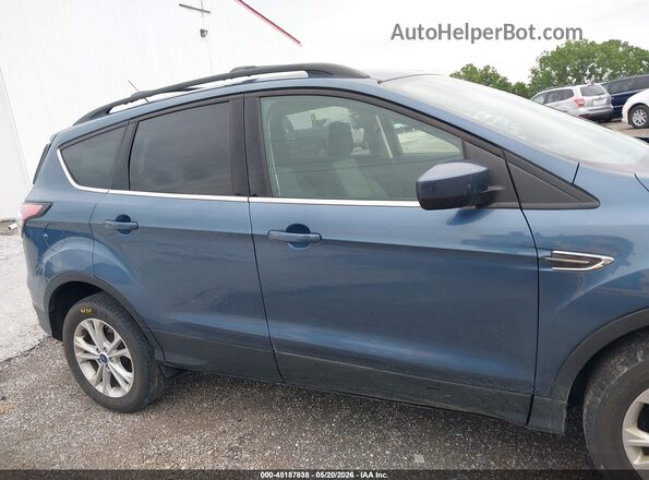 1FMCU9GD0JUC38824 2018 FORD ESCAPE Blue Vista interior trasera