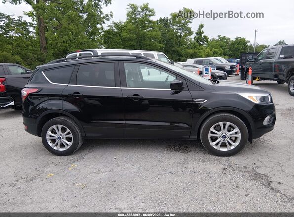1FMCU9GD0JUD08550 2018 FORD ESCAPE Gray Widok wnętrza z tyłu