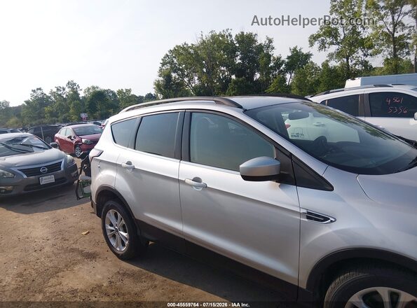 1FMCU9GD1JUD17810 2018 FORD ESCAPE Silver Widok wnętrza z tyłu