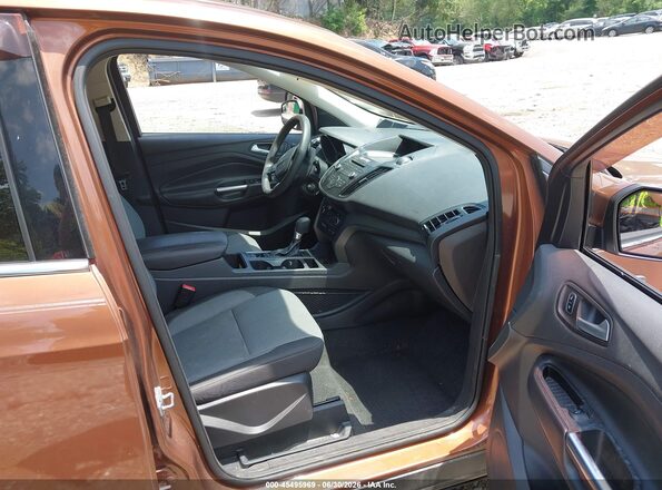 1FMCU9GD2HUB75784 2017 FORD ESCAPE Brown წინა სალონის ხედი