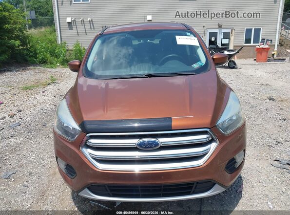1FMCU9GD2HUB75784 2017 FORD ESCAPE Brown ხელსაწყოთა პანელის ხედი