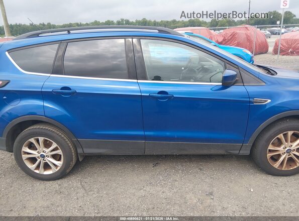 1FMCU9GD2HUE83487 2017 FORD ESCAPE Blue Rear interior view