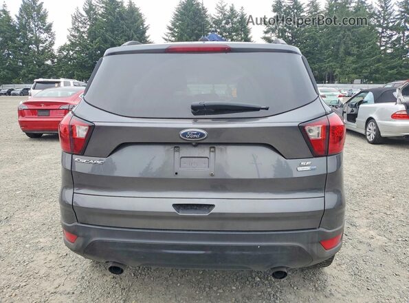 1FMCU9GD2KUB09954 2019 FORD ESCAPE Gray Rear view