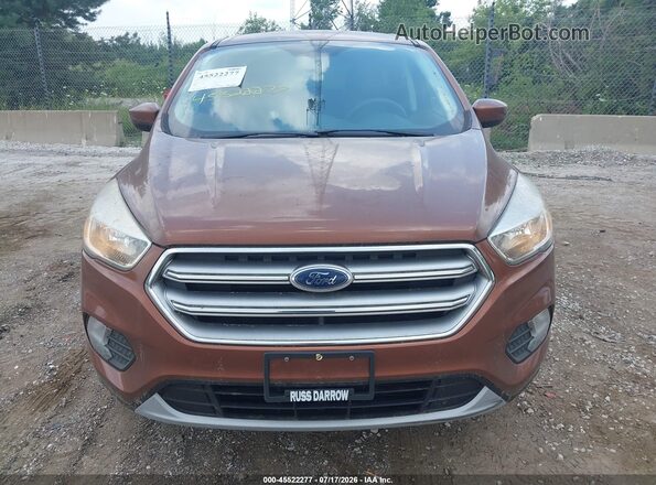 1FMCU9GD3HUA92638 2017 FORD ESCAPE Brown ხელსაწყოთა პანელის ხედი