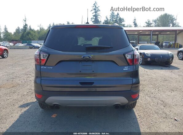 1FMCU9GD3JUC90867 2018 FORD ESCAPE Gray 