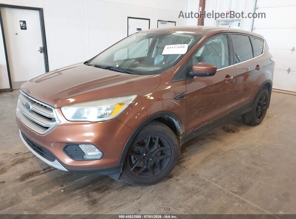 1FMCU9GD4HUB24478 2017 FORD ESCAPE Brown Vista tres cuartos delantera izquierda