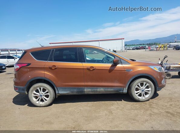 1FMCU9GD4HUB78962 2017 FORD ESCAPE Orange Rear interior view