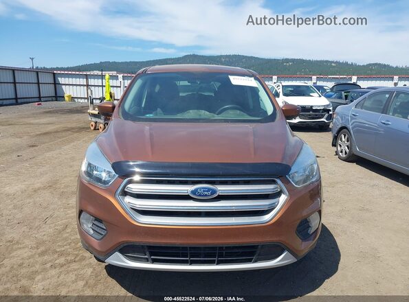 1FMCU9GD4HUB78962 2017 FORD ESCAPE Orange Instrument cluster view