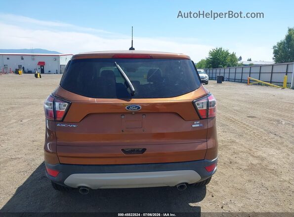 1FMCU9GD4HUB78962 2017 FORD ESCAPE Orange 