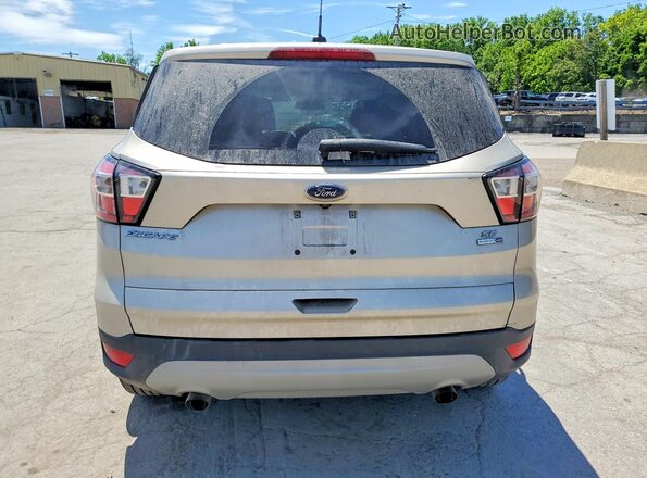 1FMCU9GD4HUC70850 2017 FORD ESCAPE Cream Rear view