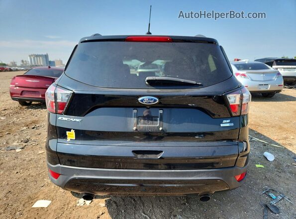 1FMCU9GD4JUB06116 2018 FORD ESCAPE Black უკანა ხედი