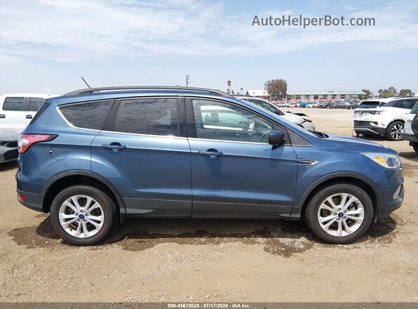 1FMCU9GD4JUB44185 2018 FORD ESCAPE Blue Rear interior view