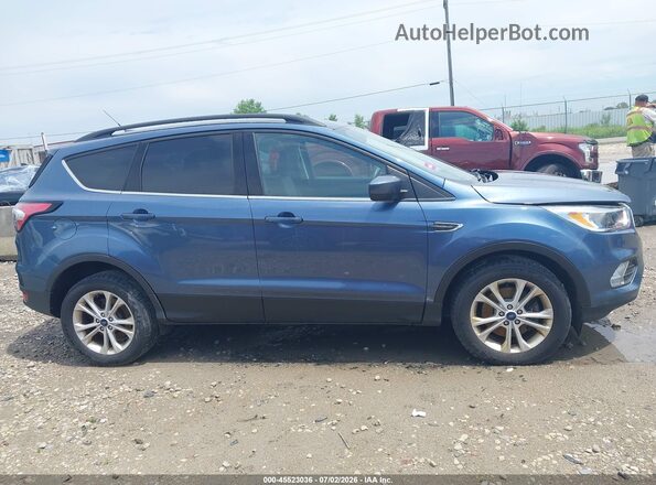1FMCU9GD4JUB73024 2018 FORD ESCAPE Light Blue Սալոնի հետևի տեսք
