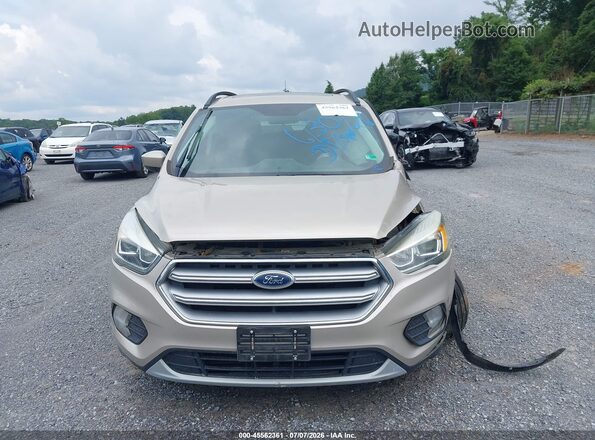 1FMCU9GD5HUA80104 2017 FORD ESCAPE Золотой Вид щитка приборов