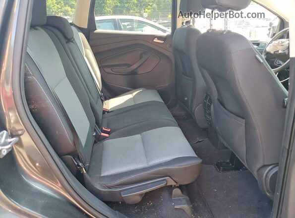 1FMCU9GD6HUB49608 2017 FORD ESCAPE Gray Widok wnętrza z tyłu
