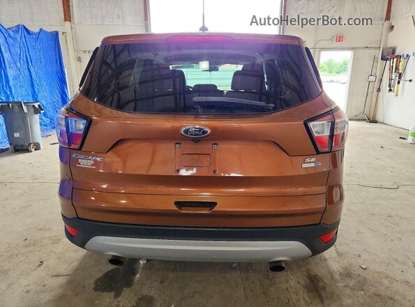 1FMCU9GD6HUC85799 2017 FORD ESCAPE Brown Rear view