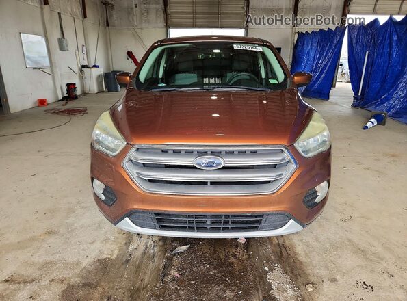 1FMCU9GD6HUC85799 2017 FORD ESCAPE Brown Front view
