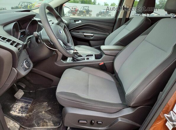 1FMCU9GD6HUC85799 2017 FORD ESCAPE Brown Front interior view