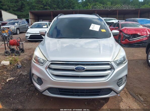 1FMCU9GD6JUB26741 2018 FORD ESCAPE Silver Widok wnętrza z tyłu