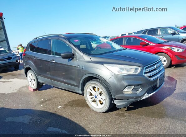1FMCU9GD6JUD07726 2018 FORD ESCAPE Gray Widok wnętrza z tyłu