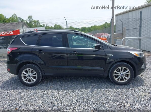1FMCU9GD6JUD08794 2018 FORD ESCAPE Черный Вид задней части салона