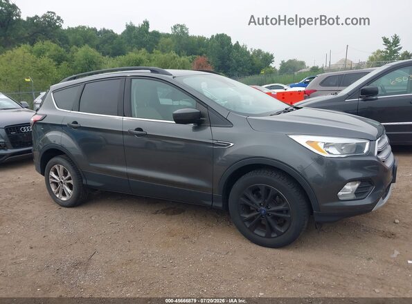1FMCU9GD7JUB29387 2018 FORD ESCAPE Gray Rear interior view
