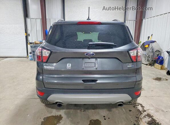 1FMCU9GD8JUB06877 2018 FORD ESCAPE Gray Vista trasera